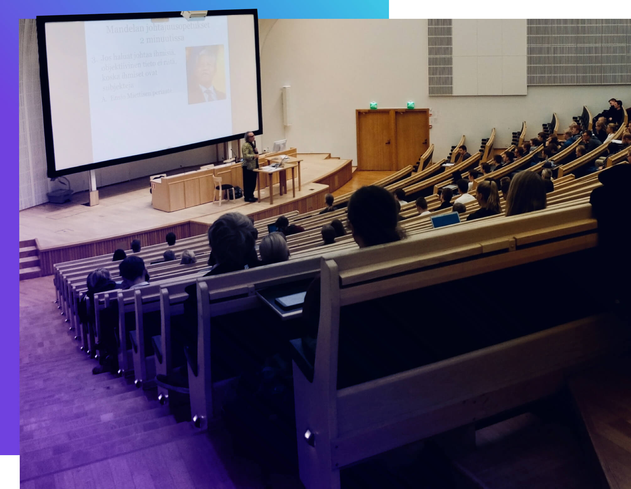 College students in an auditorium-style classroom