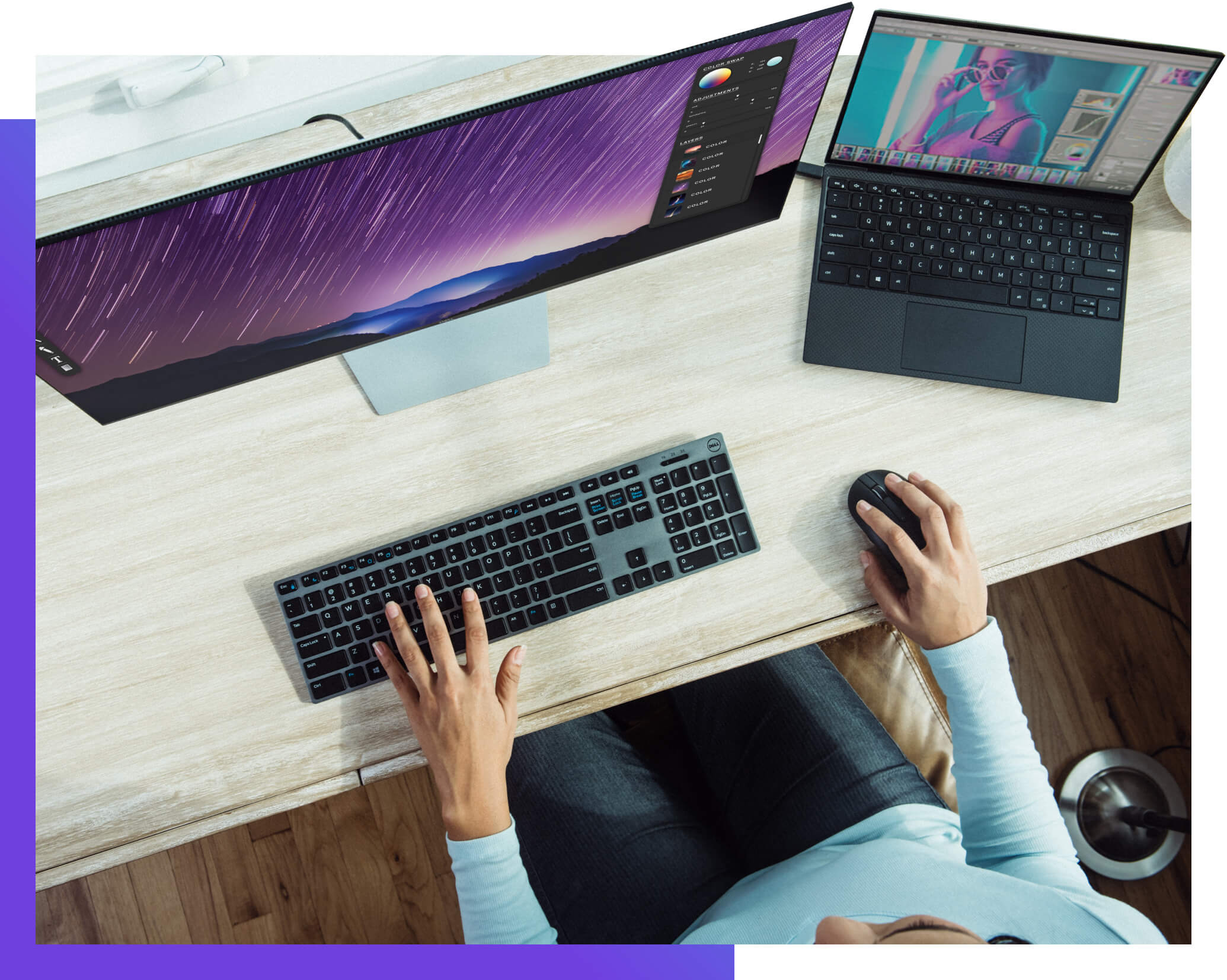 Photo of a person working on a computer at a desk