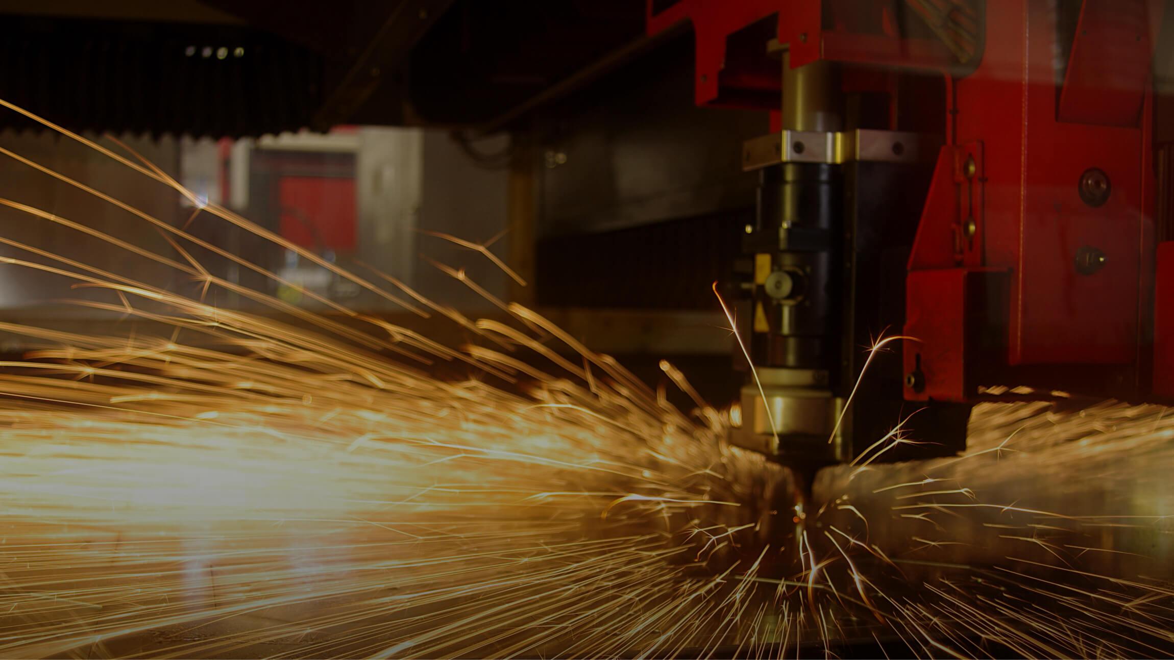 Photo of a metal cutting tool with sparks